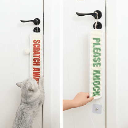 Cat using Furrther's 3-in-1 Sisal Scratch Mat with "Scratch Away" and "Please Knock" signs on door handle.